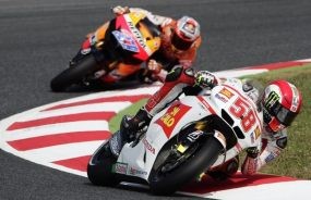Simoncelli Kalahkan Stoner untuk Rebut Pole