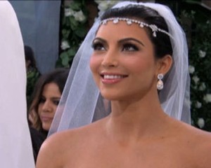 Kim Kardashian Jual Foto Pernikahan Rp 13 M