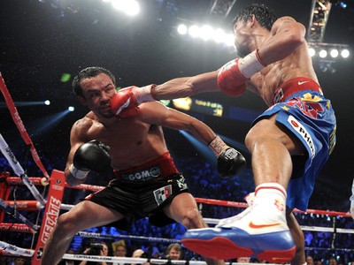 Kalahkan Marquez, Pacman Pertahankan Gelar