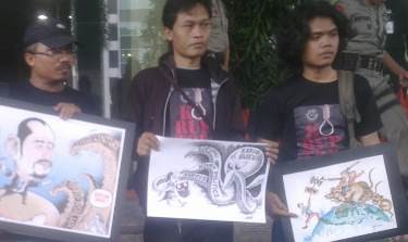 Peringatan Hari Antikorupsi, KPK Dihadiahi Karikatur