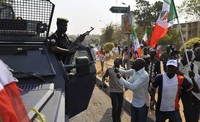 Polisi melepaskan sejumlah tembakan ke arah demonstran. Reuters/Afolabi Sotunde.