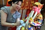 Ritual Pencucian Patung Dewa Jelang Imlek