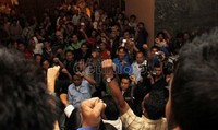Tak jauh dari ruangan Muhaimin, ada sekitar 50 orang buruh lain yang datang dari kelompok berbeda. Mereka protes karena merasa perwakilan buruh yang ikut rapat bersama Menakertrans Muhaimin Iskandar dianggap tak mewakili suara buruh secara keseluruhan.