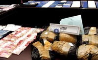 Barang bukti yang disita berupa sabu sebanyak 12.192,3 gram, 3 telepon seluler, 2 buah dompet, 137 lembar uang pecahan Rp 50.000, 6 lembar uang pecahan Rp 10.000, 2 lembar uang pecahan Rp.5.000, 1 unit truk jenis Fuso Tronton, 2 buah SIM B, 1 buah SIM C, dan 349 lembar bukti transaksi yang dilakukan tersangka dari berbagai bank.