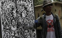 Aksi ini digelar di depan gedung Tipikor, di saat Nazaruddin jalani sidang, Rabu (15/2/2012). Ramses/detikcom.