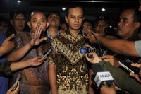 Dhana Widjatmika (tengah) usai menjalani pemeriksaan di Kejaksaan Agung (Kejagung). Jhoni Hutapea/detikcom.
