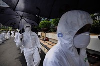 Aksi ini juga sebagai peringatan satu tahun gempa bumi yang terjadi di Jepang yang berakibat pada bencana nuklir Fukushima.