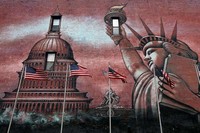 Sebuah mural di dinding kota menyambut pemilihan Super Tuesday.  Partai Republik mengusung isu kemiskinan untuk melawan president incumbent Barrack Obama. (Foto: Mario Tama/Getty Images)