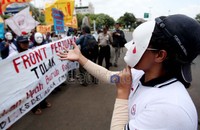 Aksi yang berjalan sekitar 40 menit ini berjalan tertib. Tidak ada penjagaan khusus dari kepolisian.