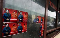 Tampak dikaca pos depan rumah dinas Wali Kota Bekasi nonaktif Mochtar Muhammad, terpasang stiker istrinya Ny Sumiyati yang akan maju pencalonan Walikota Bekasi.