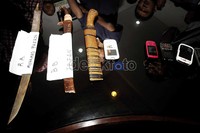 Dari para tersangka polisi menyita barang bukti senjata tajam dan beberapa handphone.