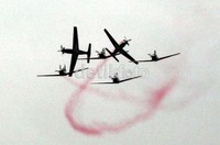 Rangkaian demo udara peringatan HUT ke-66 TNI AU, disemarakkan dengan penampilan Jupiter Aerobik Team di Lanud Halim Perdakusuma, Jakarta.