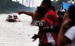 Diguyur Hujan Lomba Dayung Tetap  Meriah