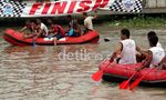 Diguyur Hujan Lomba Dayung Tetap  Meriah