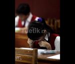 Ssssttt...Harap Tenang, Siswa SD Sedang UN