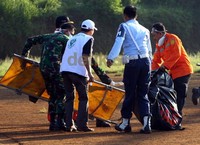 Sedikitnya sudah ada empat kantong jenazah yang sudah tiba di Bandara Halim Perdanakusuma pagi ini. (Ramses/detikcom)