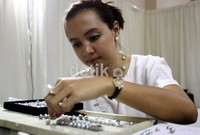 Mutiara Dobo adalah hasil kekayaan laut di kawasan perairan Maluku. Saat ini, Dobo adalah jenis mutiara berkualitas terbaik.