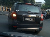 Mmm, apa pengemudi Captiva ini merasa paling pintar ya? (Foto Tony Setiawan Gani)