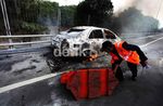 Taksi Terbakar di Tol Cawang