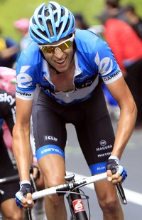 Ryder Hesjedal memacu sepedanya dalam kejuaraan balap sepeda Giro dItalia 2012. Pembalap dari tim Garmin Barracuda itu menjadi juara umum balap sepeda Giro dItalia 2012 setelah secara dramatis merebut kaus pink pada etape XXI (terakhir) nomor ITT 28,2 km. Reuters/Alessandro Garofalo.