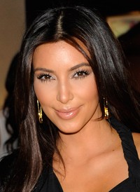 Kim tampil dengan make up natural. David Becker/Getty Images.