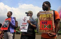 Mereka berharap pemerintah segera mengusut pelaku penembakan di Papua. Agung Pambudhy/detikcom.