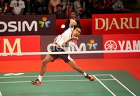 Dionysius Hayom Rumbaka melakukan smash keras saat melawan Simon Santoso di babak perempatfinal Djarum Indonesia Open Premier Series 2012. Namun Hayom harus menelan kekalahan atas Simon.