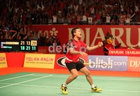 Simon Santoso mengekspresikan kemenangan usai mengalahkan lawannya.