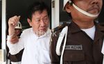 Menutup Wajah, Buron Korupsi Rp 5,6 M Ditangkap