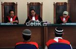 Pembunuh dalam Koper, Satu Dipenjara-Satu Bebas