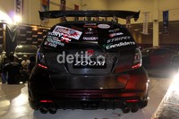 Mobil keluaran 2010 ini juga telah dipasangi sebonggol NOS di kabin bagian belakang. Untuk menyelaraskannya, Kevin menggunakan turbo kit zage, Oil coller Autobahn, Billion thermo wrap, oil catch tank, groundwire HKS circle earth, strut bar, extra injector, Dastek q+, throttle control buddy club, dan turbo module. (M Ikhsan/detikOto)