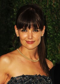 Menghadiri Vanity Fair Oscar Party 2012 di Sunset Tower, West Hollywood, California, pada 26 Februari 2012, Katie tampil menawan dengan lipstick merahnya. Pascal Le Segretain/Getty Images.