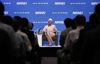 Christine Lagarde dalam pertemuan IMF dan World Bank. Masalah mata uang Yen dan ekspor Jepang menjadi pembahasan utama dalam pertemuan ini. Reuters/Kim Kyung-Hoon.