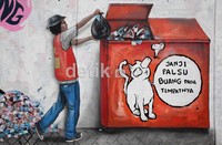 Kepiawaian seni mural membuat pesan-pesan mudah dicerna oleh pelintas jalan.