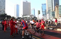 Dalam aksinya mereka juga meminta dukungan masyarakat agar menjadi juara umum PON XVIII/2012 Riau September mendatang.