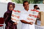 Senyum Lebar Nono Nyoblos Pilgub DKI