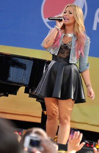 Demi mengisi acara Good Morning America di ABC TV di Rumsey Playfield, Central Park, New York City pada 6 Juli silam.Stephen Lovekin/Getty Images