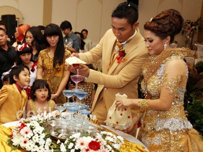 Mengintip Resepsi Pernikahan Okie-Gunawan