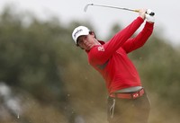 Salah satu peserta British Open asal Irlandia Rory Mcilroy turut mencoba sesi latihan ini. British Open menjadi salah satu kejuaran bergengsi di ajang golf internasional. Reuters/Cathal McNaughton.
