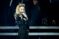 Madonna tampaknya berhasil memuaskan penonton dengan penampilan enerjiknya. Ian Gavan/Getty Images.