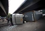 Truk Kontainer Terguling di Tomang