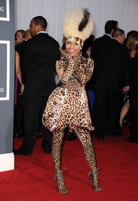 Nicki Minaj sepertinya sangat mencintai motif leopard. Ia membungkus tubuhnya from head to toe dengan motif leopard saat menghadiri acara The 53rd Annual GRAMMY Awards pada 13 Februari 2011. Jason Merritt/Getty Images.