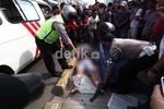 Pemotor Tewas Tertabrak TransJ