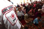 PMI Bagikan Paket Santunan untuk Dhuafa