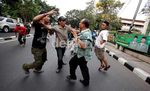 Pendemo Korupsi Alquran Dibubarkan Paksa