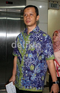 Dhana meninggalkan ruang sidang Pengadilan Tipikor, Jakarta. (Ramses/detikcom).