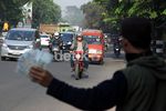 Jelang Lebaran, Jasa Penukaran Uang Receh Marak