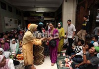 KD hadir dengan menggunakan busana serba ungu.