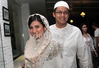 Ia tampil serasi dengan sang suami. Gus Mun/detikcom