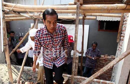 Jurus Jokowi Menata Warga di Bantaran Sungai Ciliwung